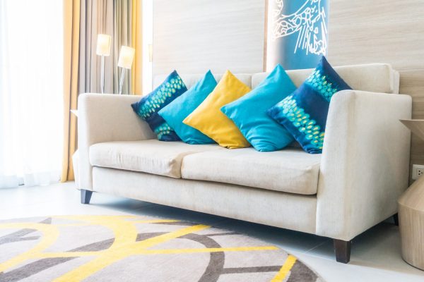 blue-cushions-one-yellow-cushion